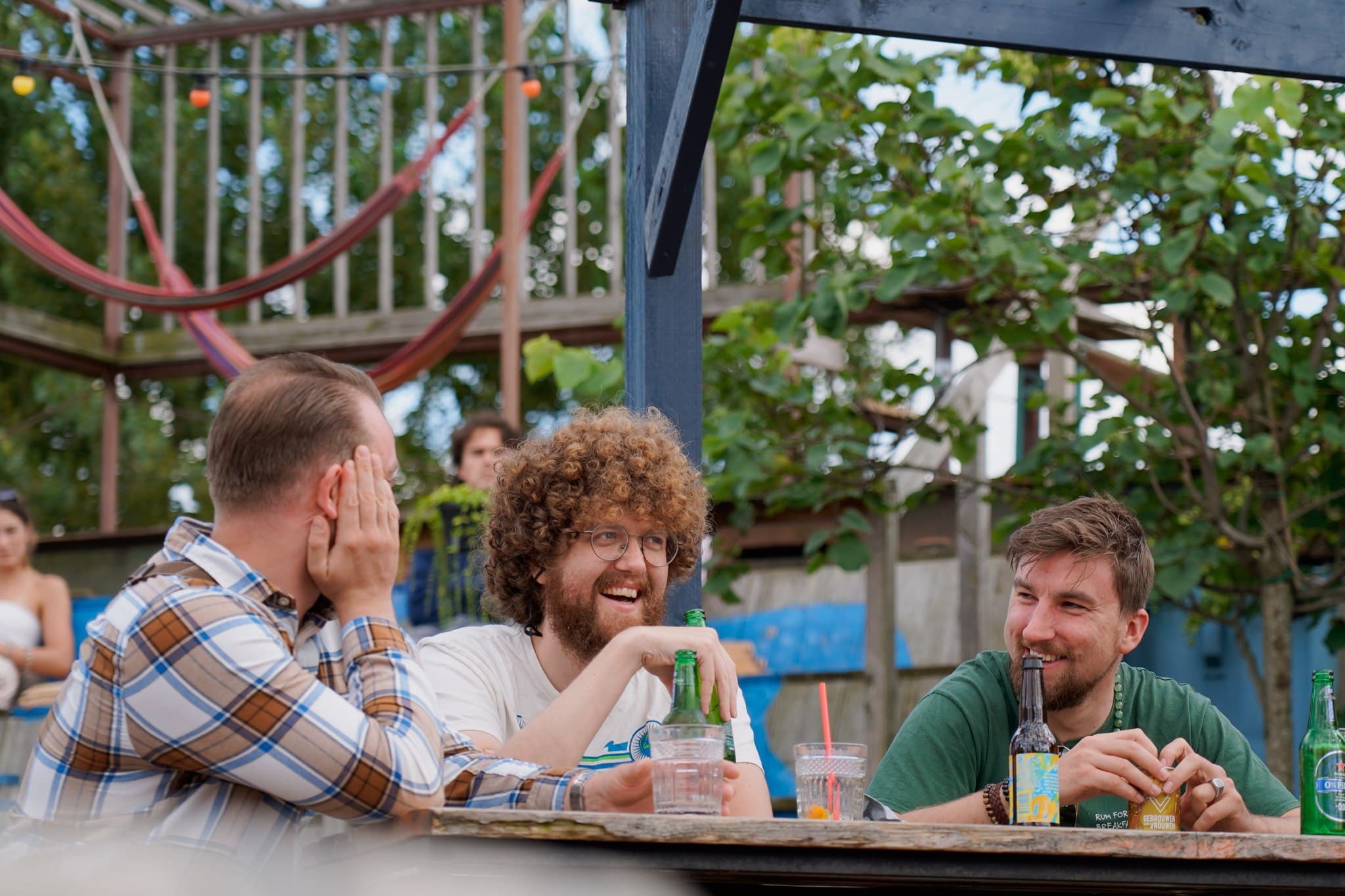 Rum for Breakfast sharing a meal at an outdoor table.