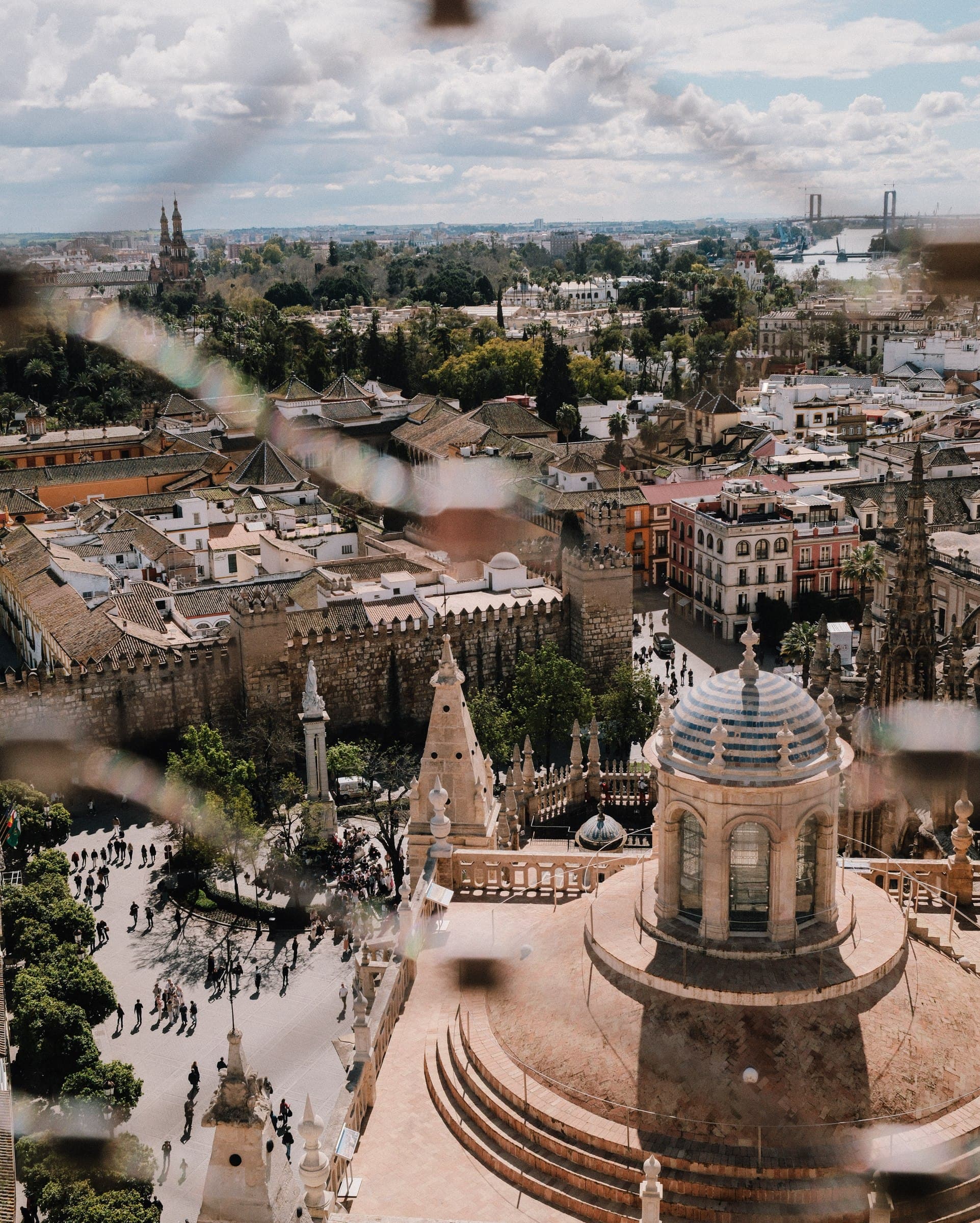 View across city rooftops from an elevated terrace.
