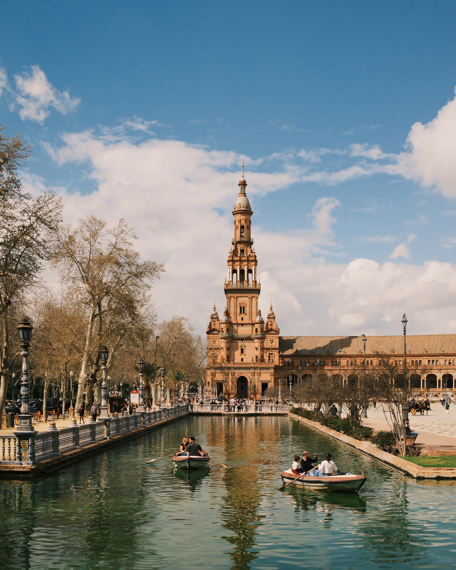 A canal and ornate architecture at Plaza de España.